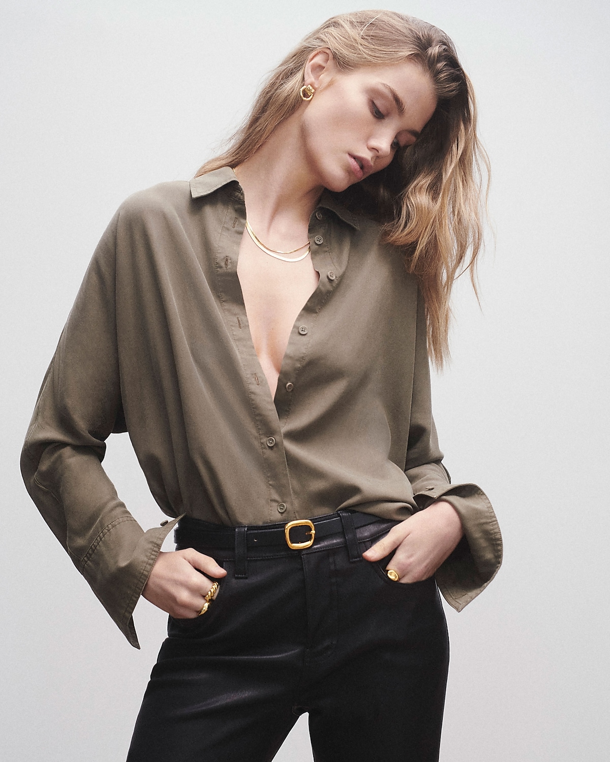 women wearing a button down shirt