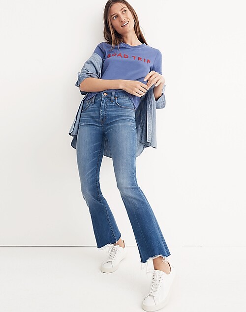 madewell cali demi-boot jeans worn with mockneck pullover sweater.