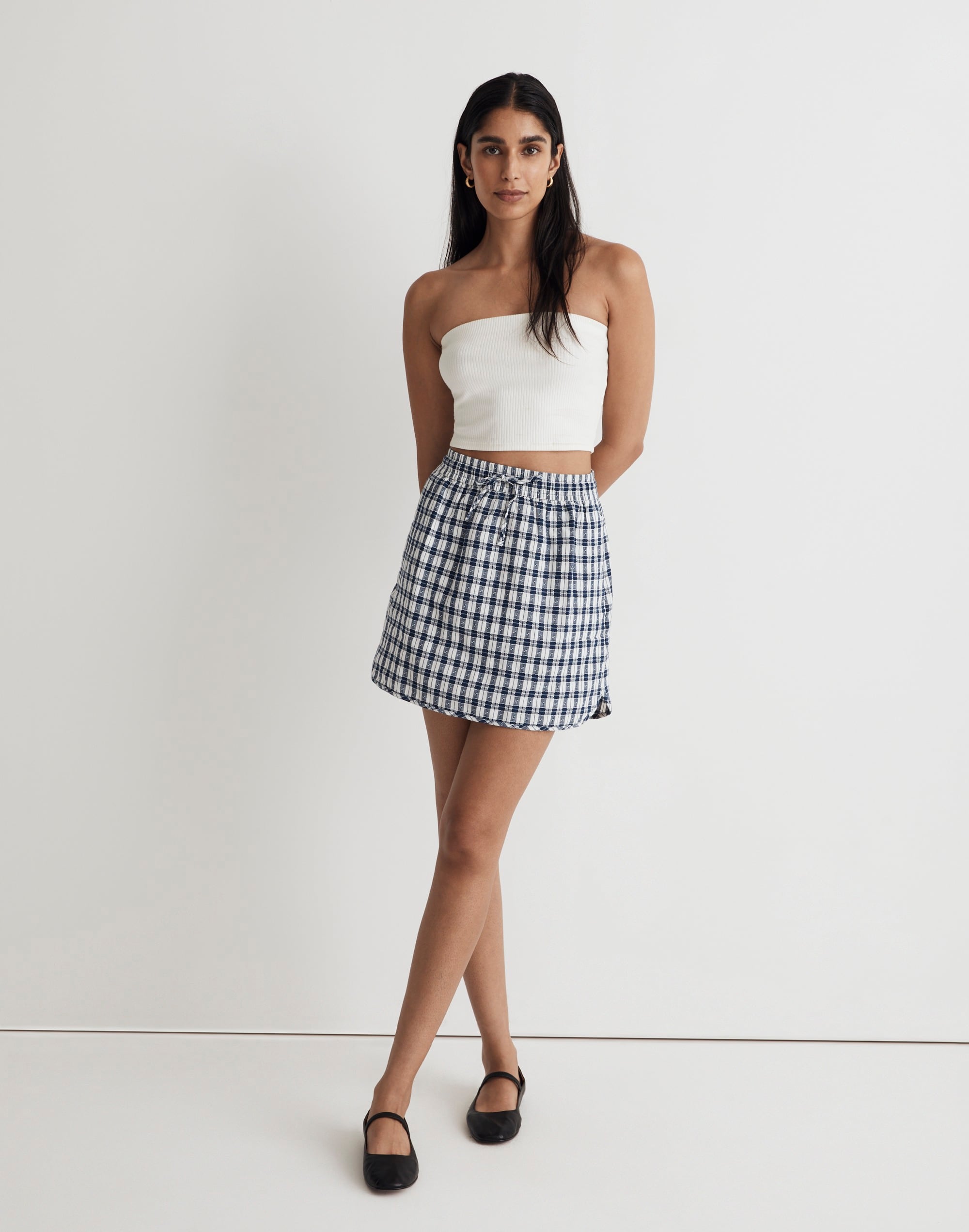 Curved-Hem Mini Skirt in Plaid