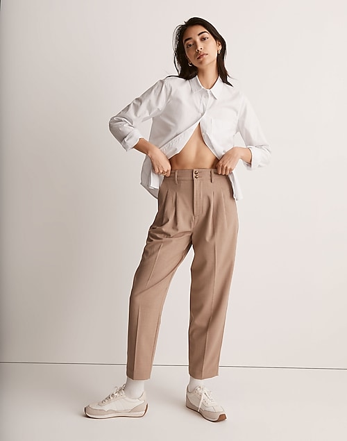Suit. Women trouser suit. Trousers with pleats on the front and back, –